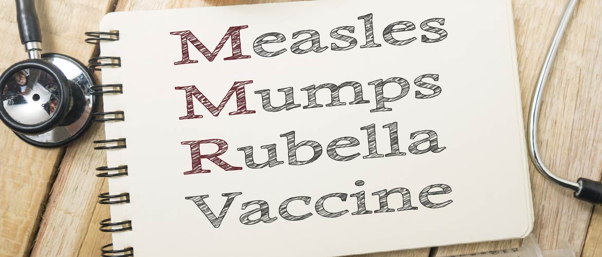 a sign that says measles, mumps and rubella vaccine
