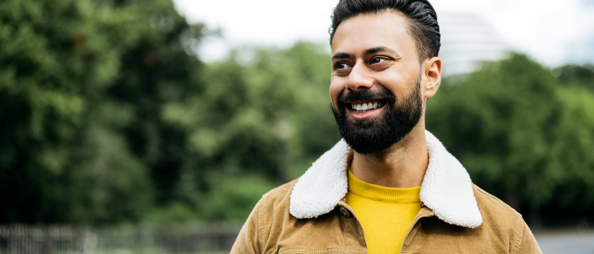 man smiling in jacket