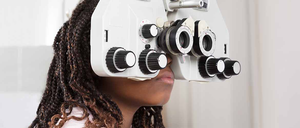 a woman undergoing an eye exam