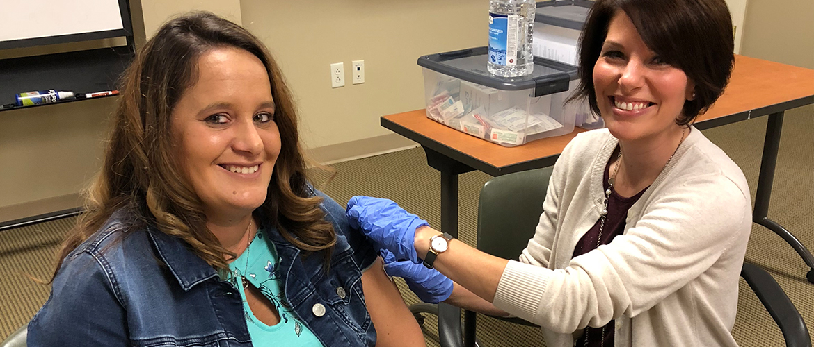 female and nurse after flu shot