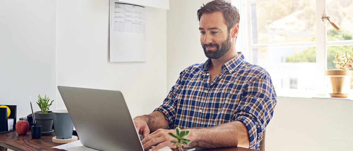 man working on his laptop