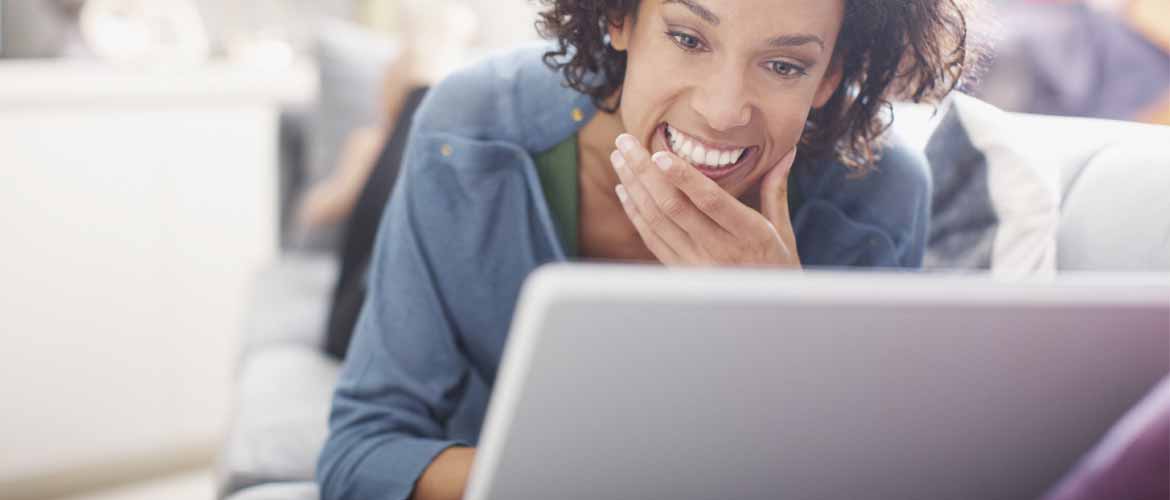 woman looking at laptop