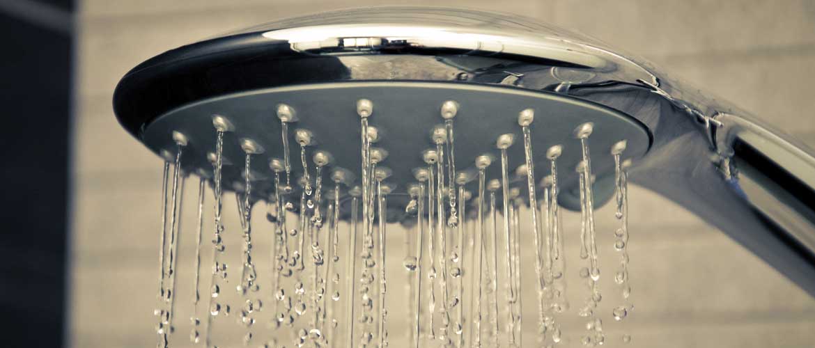 Shower head with water flowing out from it