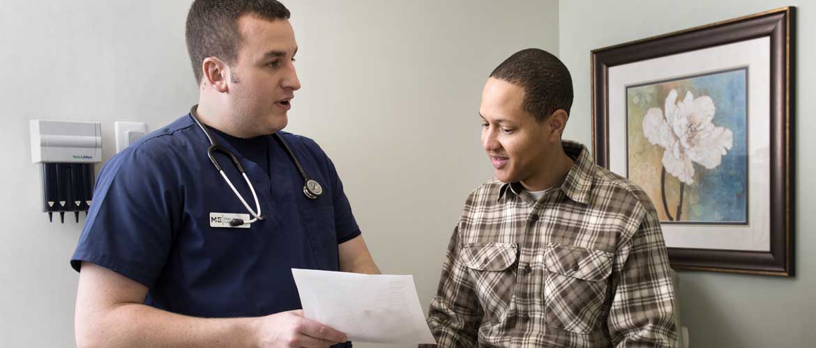 Man smiling at his health care professional