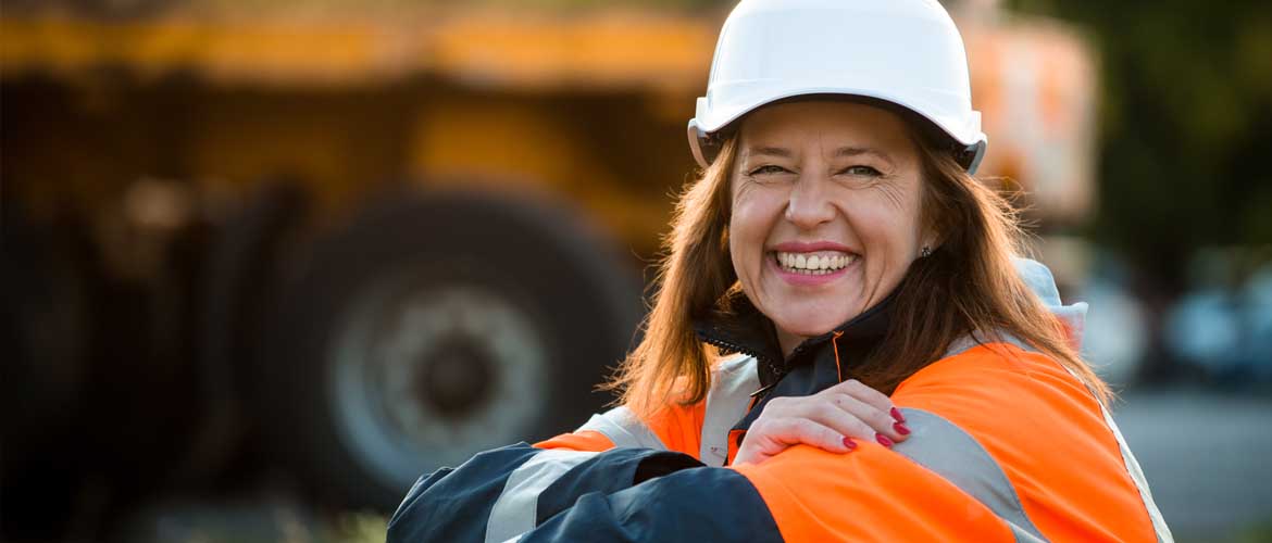 woman in hard hat smiling
