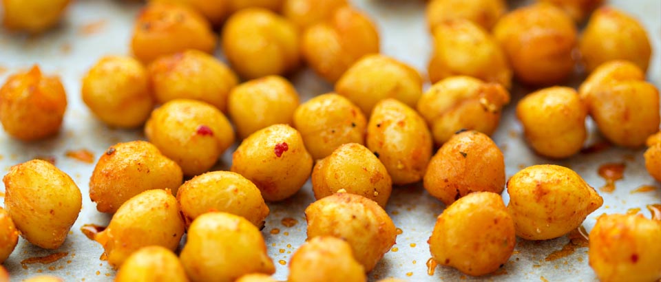 chickpeas roasted with spices on baking sheet